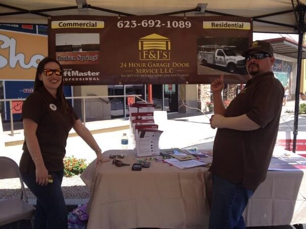 F&J’s 24 Hour Garage Door Service team at a local event booth in Phoenix showcasing residential and commercial services